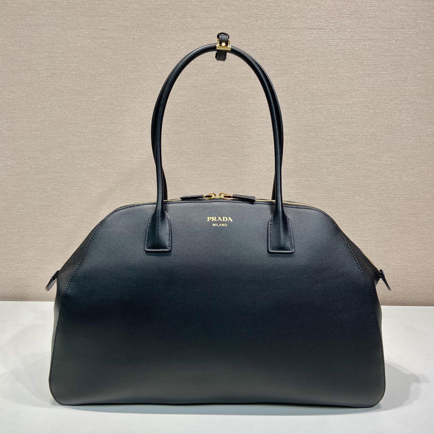 Pra*a top handle bags